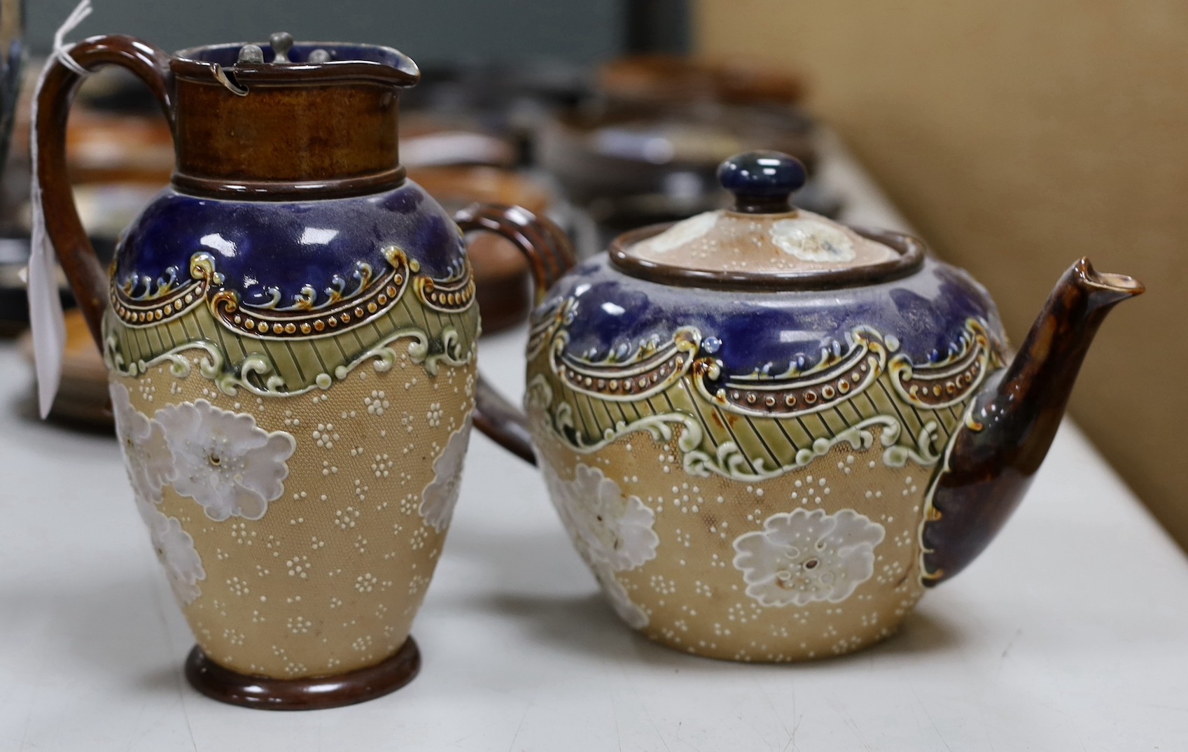 A Doulton siliconware jardiniere and other Doulton Lambeth ceramics, jug 19ms high